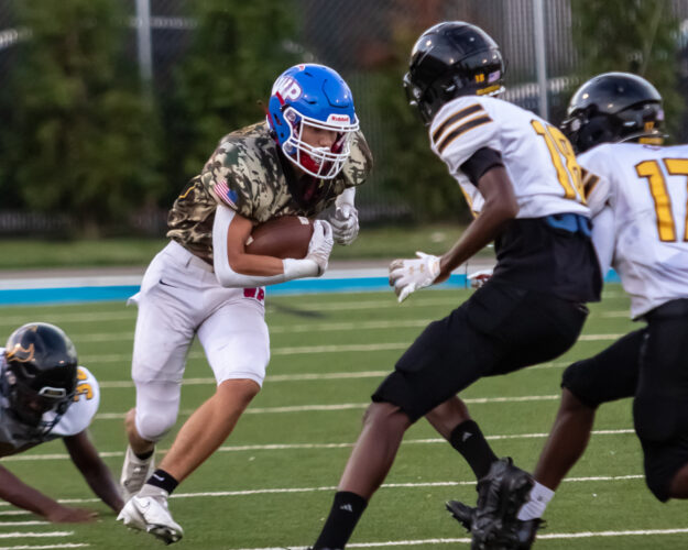 Battle Brewing Between Big-School Bruisers